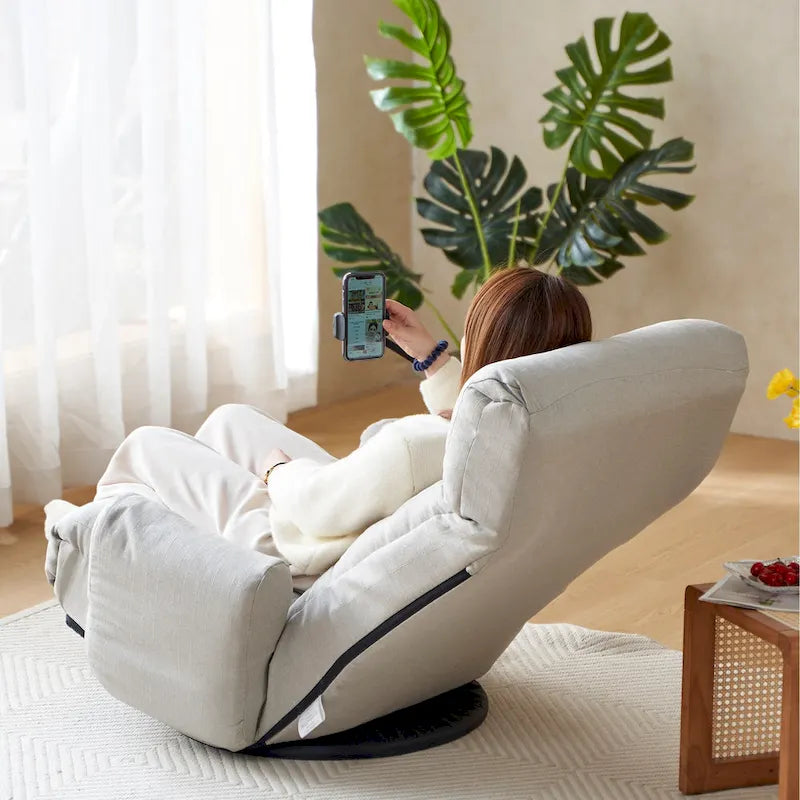 Fauteuil inclinable pivotant gris avec support de téléphone, appui-tête réglable