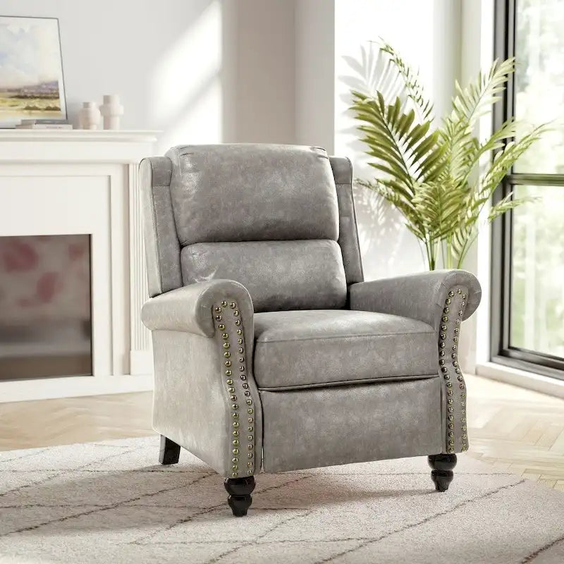 Fauteuil inclinable à dossier basculant, assise rembourrée et cloutée